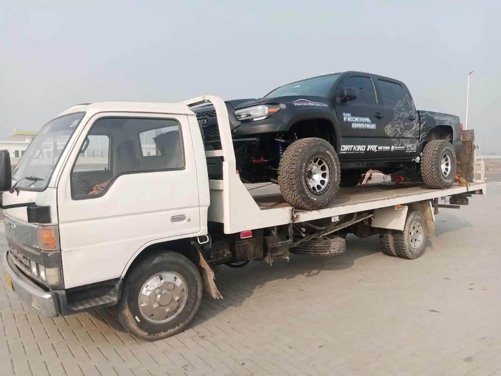 Flatbed towing service for luxury and damaged cars